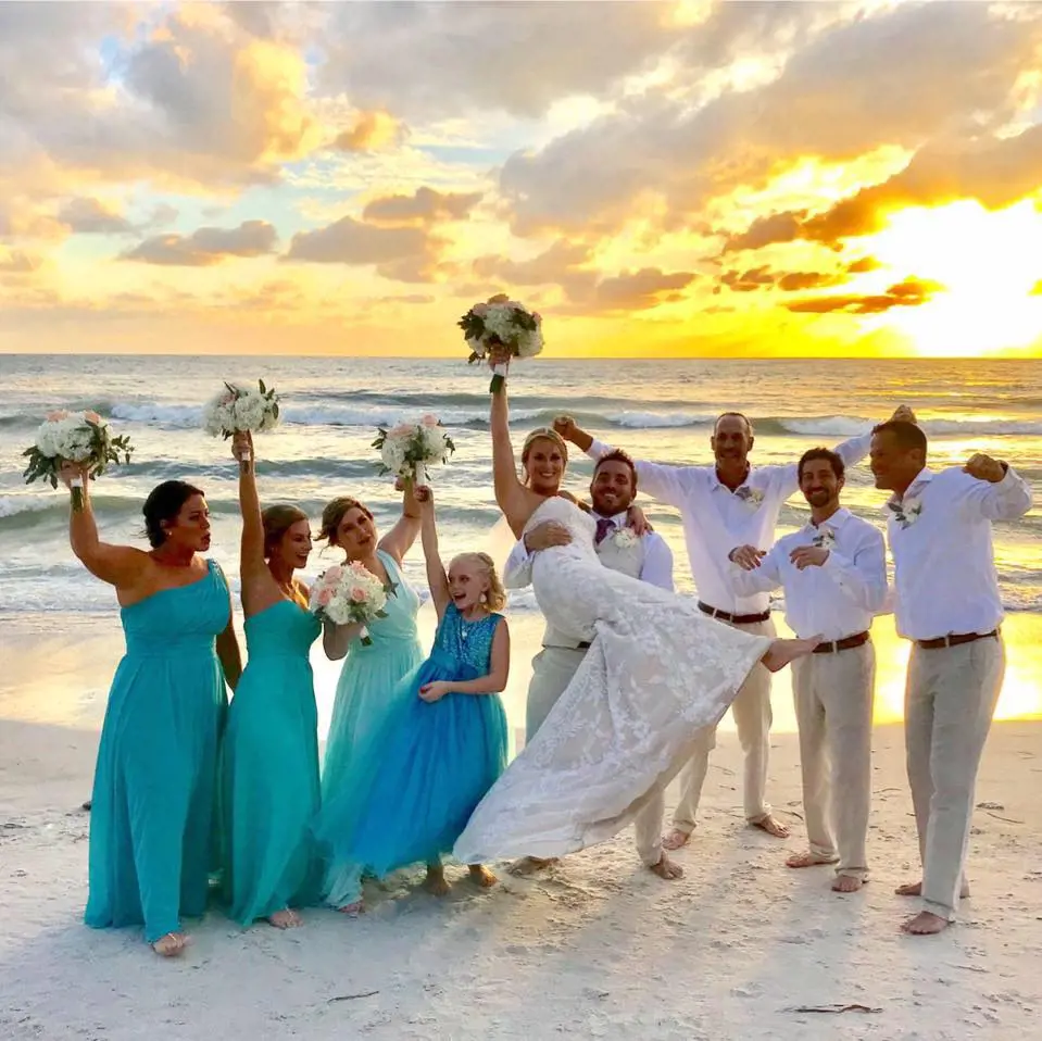 A beach sunset wedding by Florida Sun Wedding 