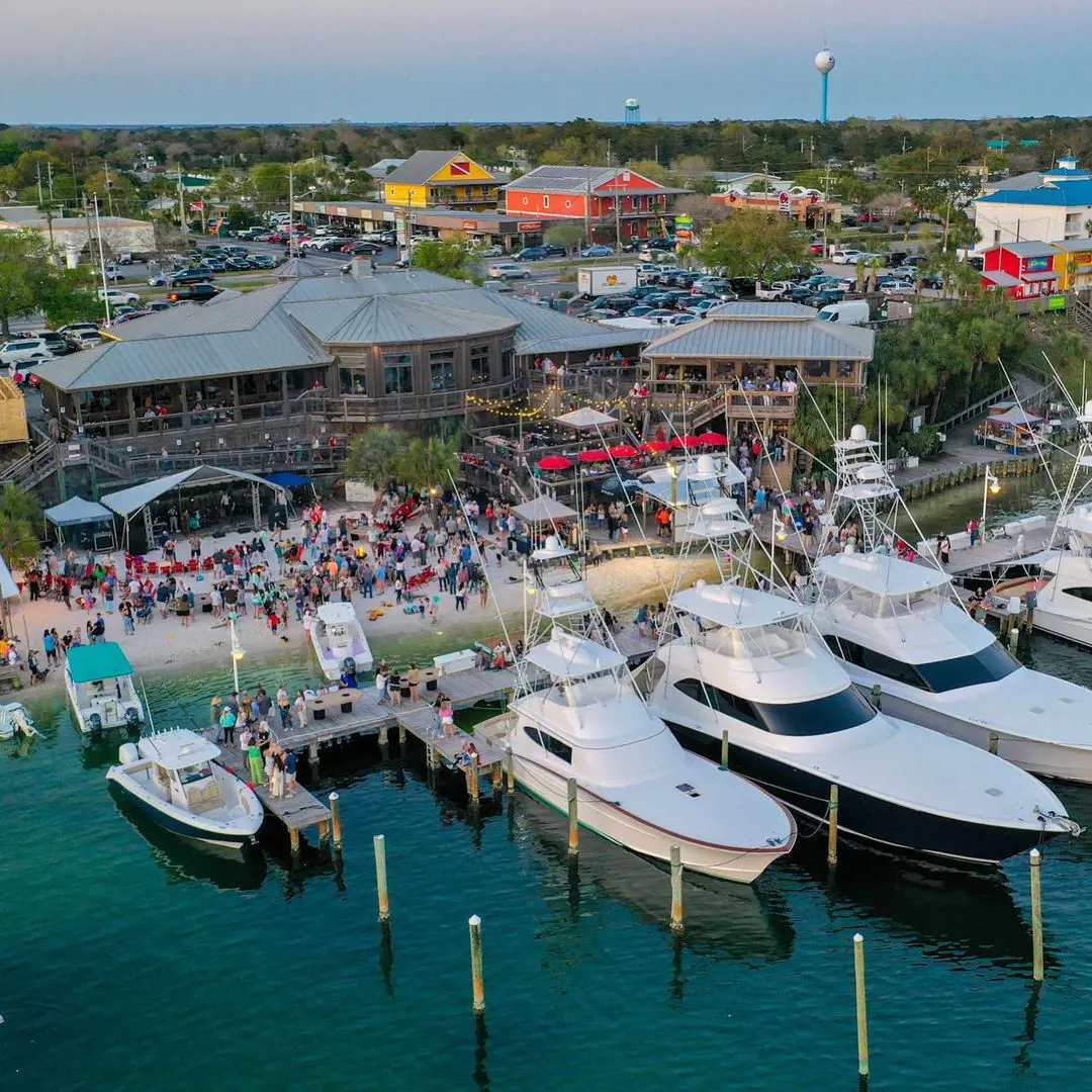 Boshamps Seafood & Oyster House has tables touching the water