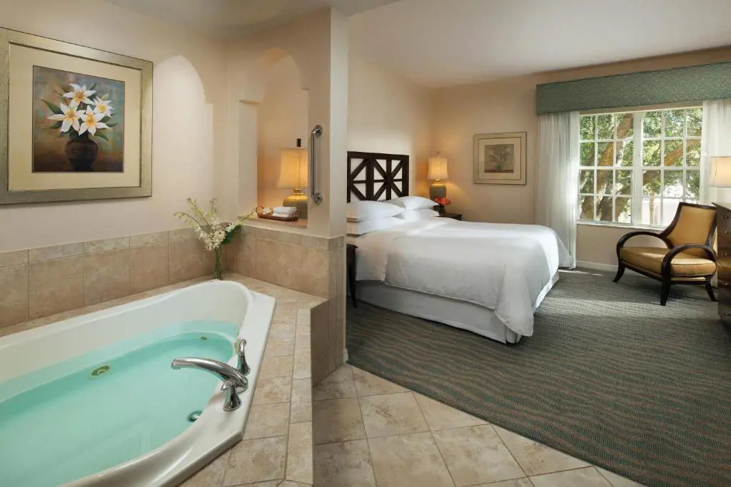 Sheraton Vistana Resort Villas with a big suit room and Jacuzzi in the corner
