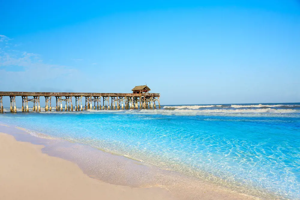 Enjoy the Cocoa Beach Pier and waves of the place